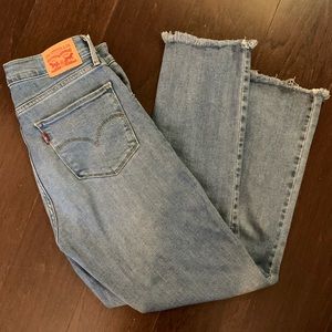 Levi’s Ripped High Rise Straight Leg Jeans